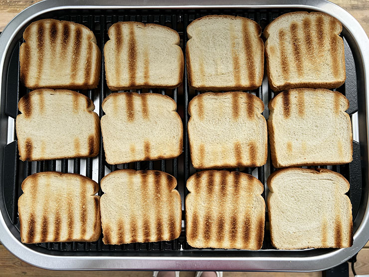 pieces of bread on Weber Lumin electric grill