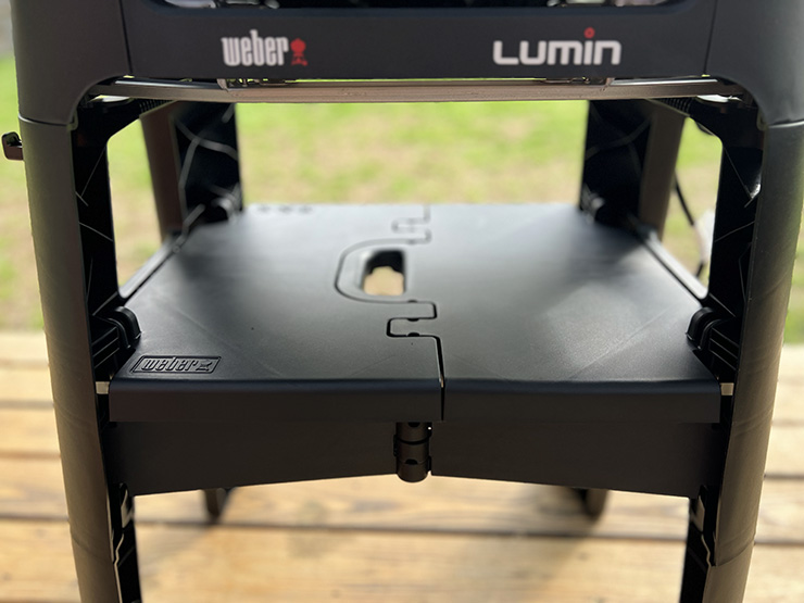 a close up view of the Weber Lumin stand
