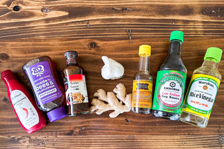 korean bbq sauce ingredients on a wooden board
