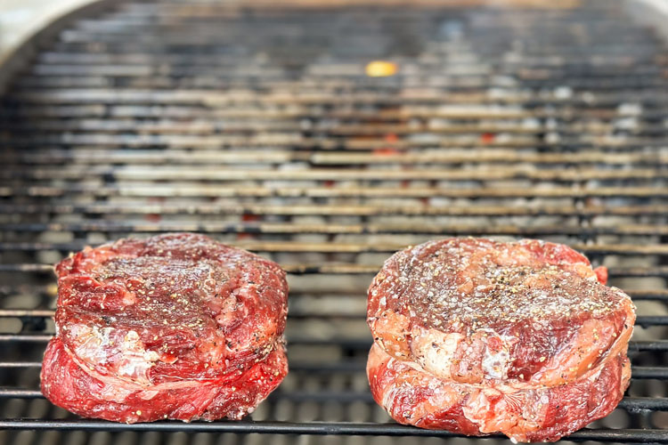 ribeye caps on charcoal grill