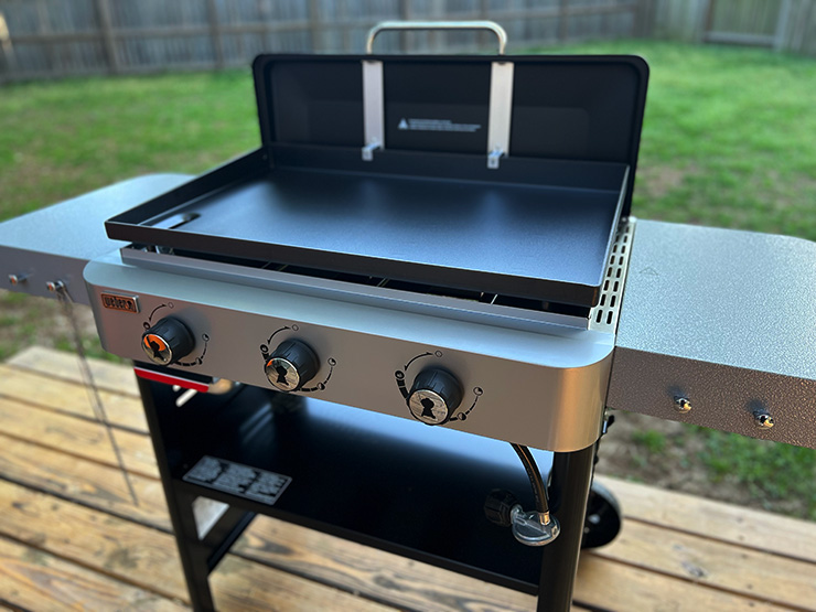 a side view of the Weber Griddle with an open lid