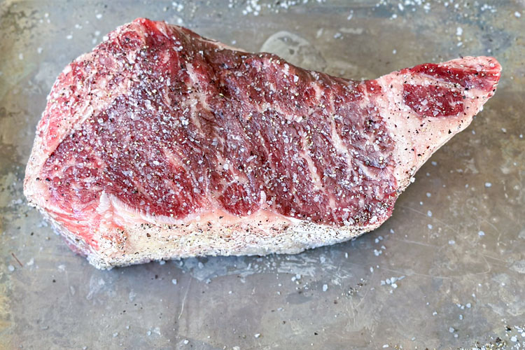 raw seasoned delmonico steak