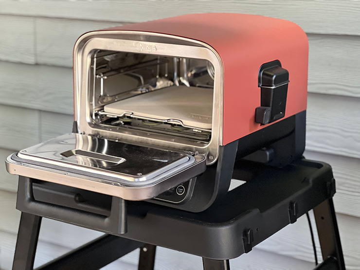 Ninja Woodfire Outdoor Oven with an open door
