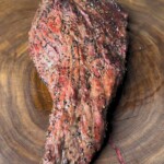 smoked tri-tip steak on a wooden board