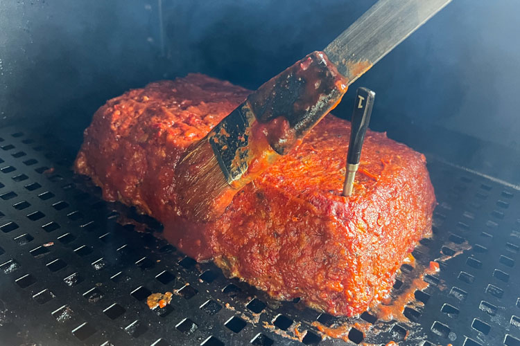 meatloaf being basted