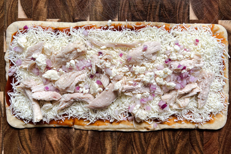 bbq chicken pizza with uncooked toppings