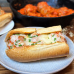 homemade smoked meatball sub served on a light plate