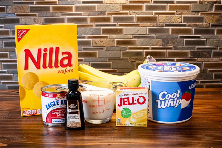 banana pudding ingredients on a wooden bench