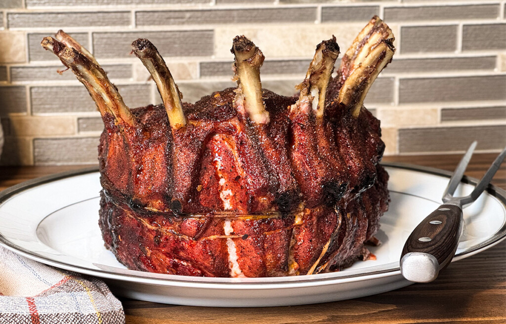 crown of pork on plate ready to carve