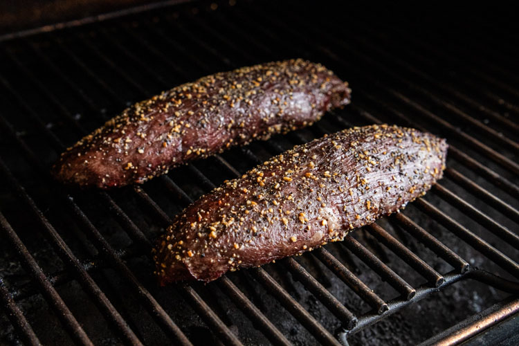 smoking a teres major steak on a grill