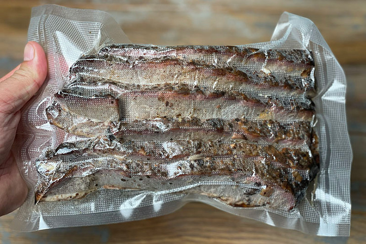 a serving size of leftover brisket stored in a vacuum sealed bag