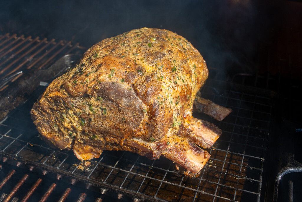 a prime rib roast half way through the smoking