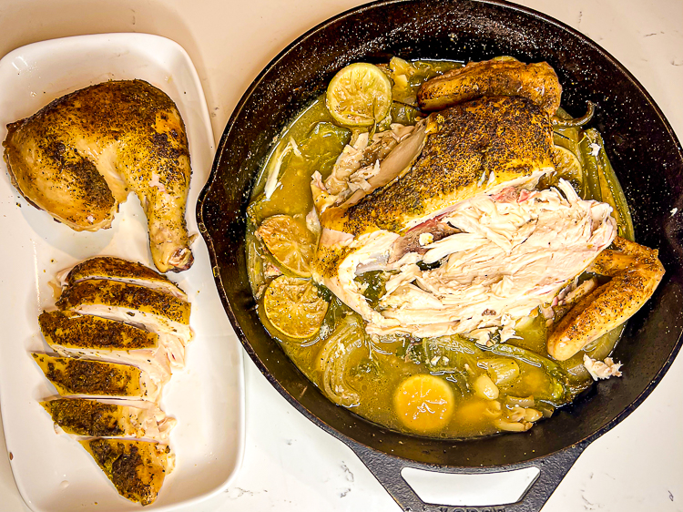 carved blue moon chicken in a skillet