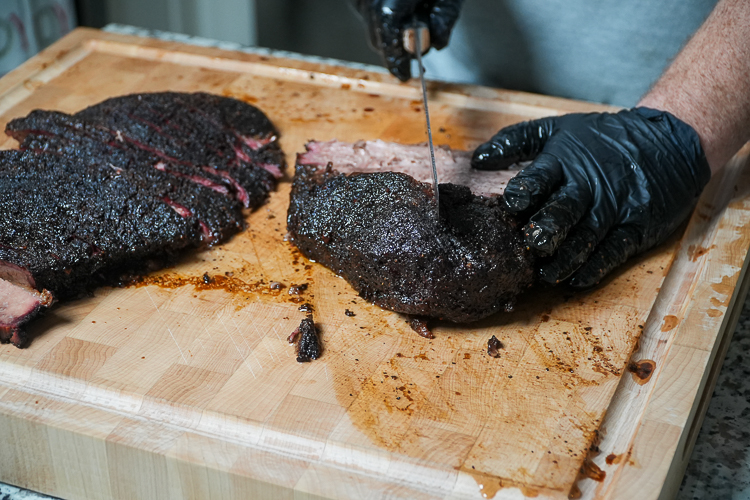 cutting the flat from the point of the brisket
