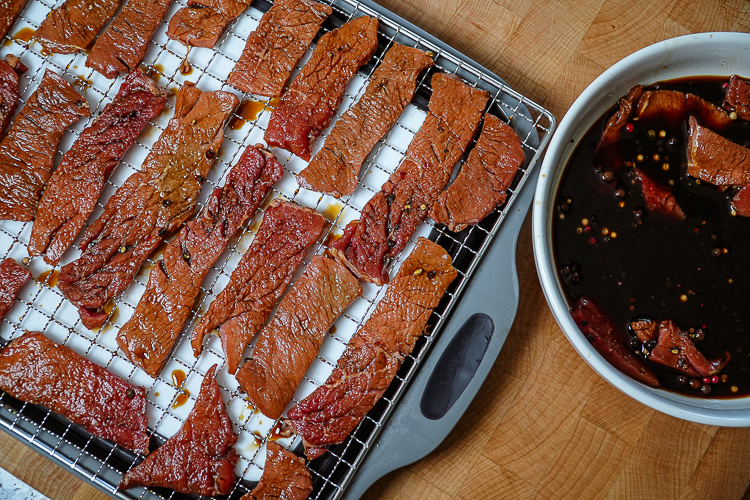 peppered beef jerky on dehytrator tray