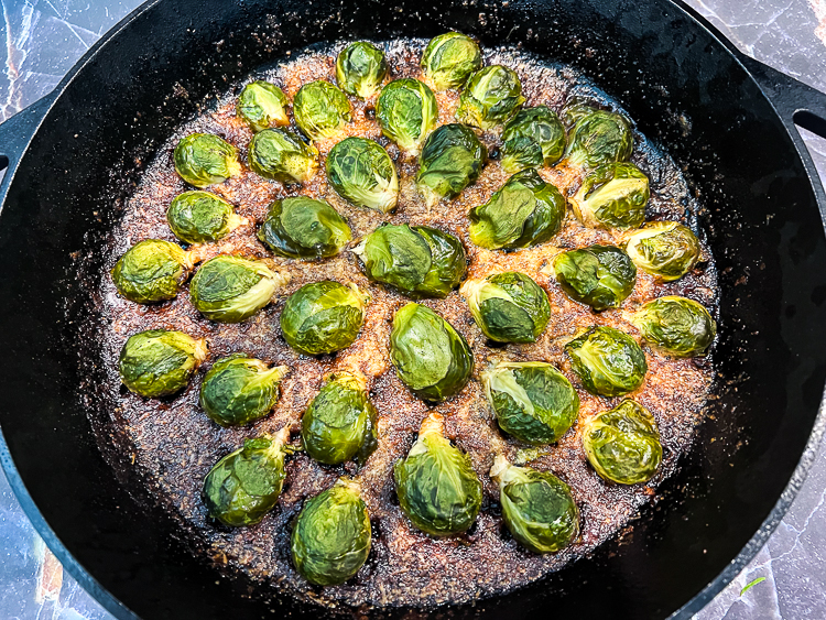 cooked brussels sprouts in a skillet
