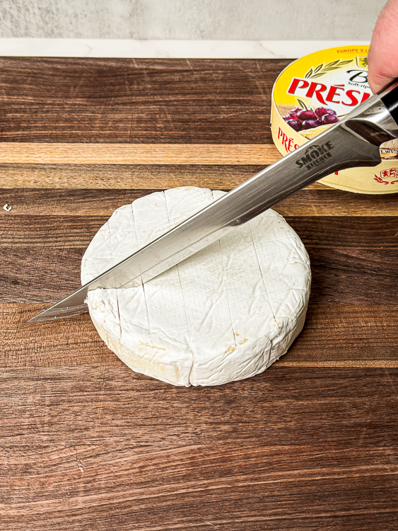 scoring a wheel of brie