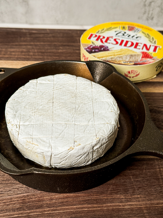 scored wheel of brie