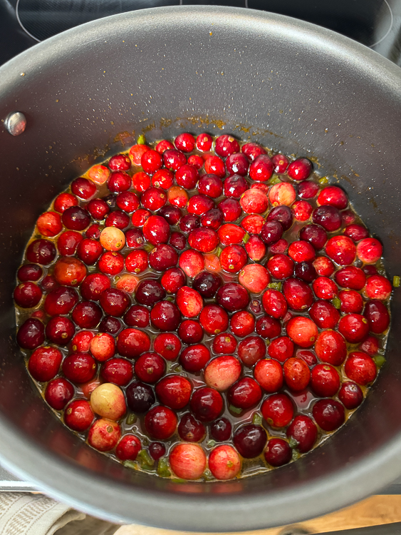 pot of cranberries on the smoker