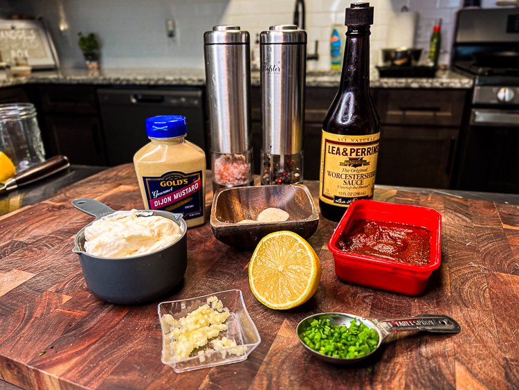 remoulade ingredients laid out on a wooden board