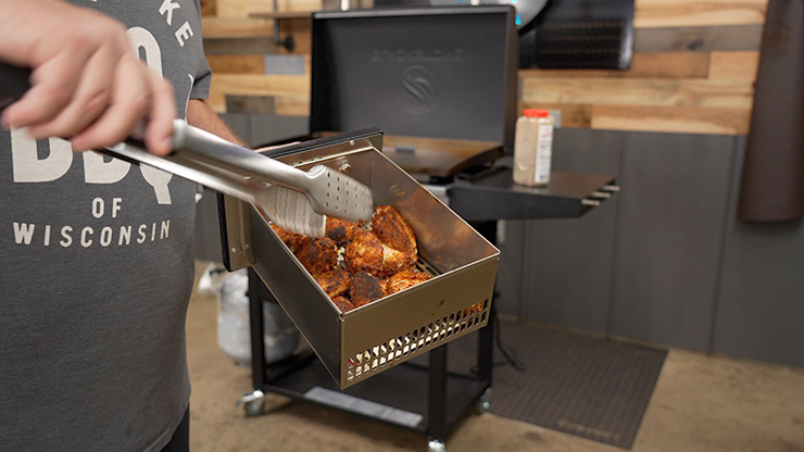 fried chicken wings inside the Blackstone 28" air fryer