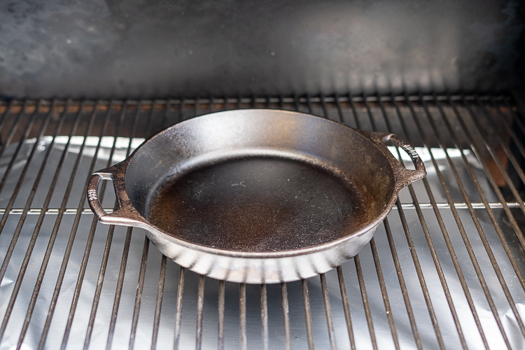 skillet heating up in the smoker