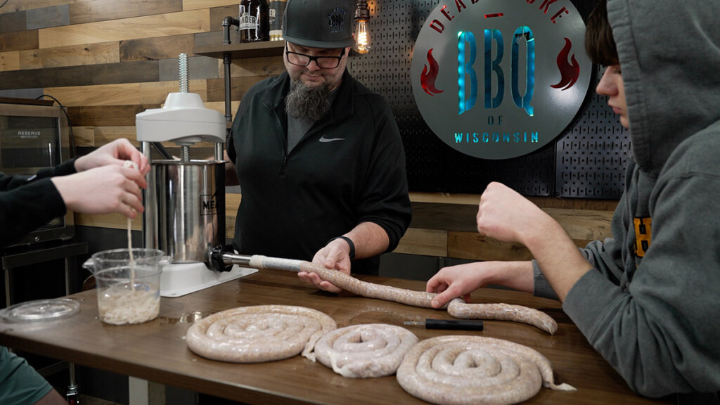 family stuffing sausage