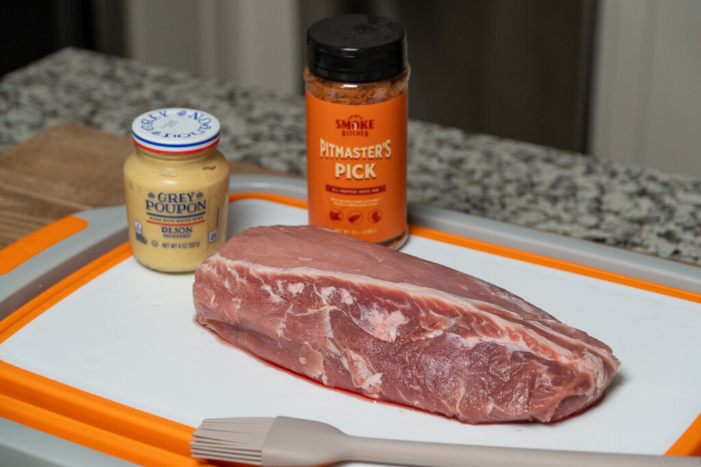 smoked bbq pork loin ingredients on a white board