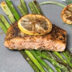 Griddle grilled salmon fillet served with grilled asparagus.