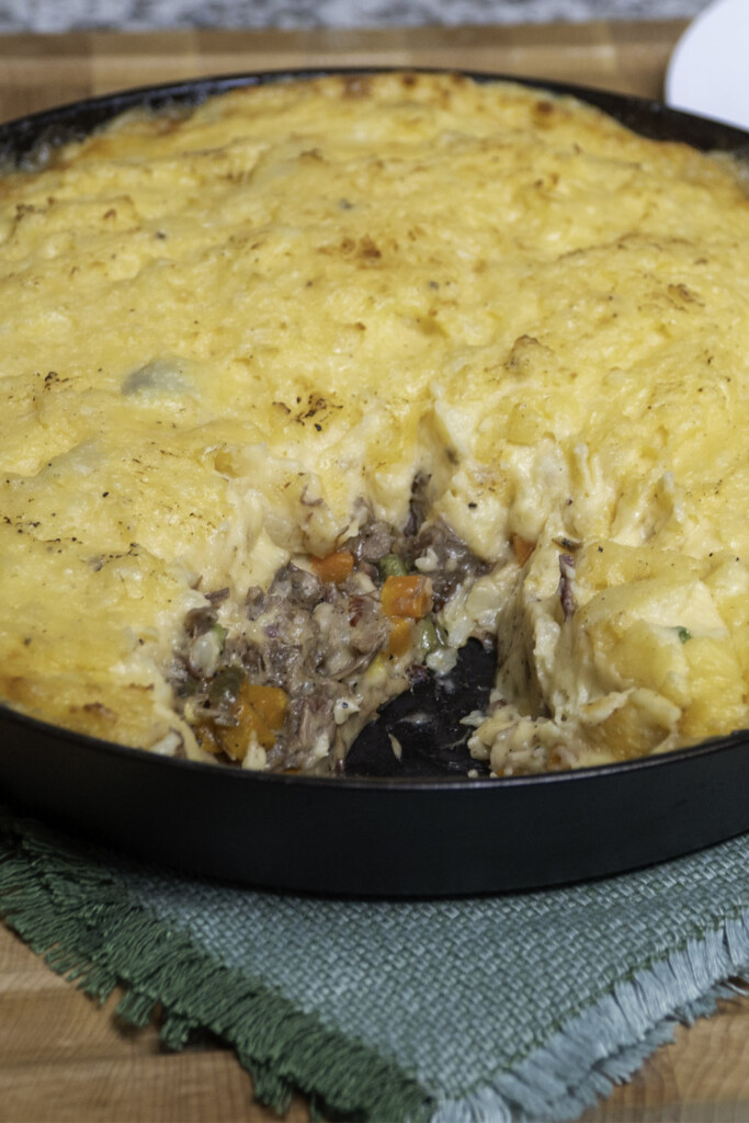 brisket shepherds pie with a spoonful removed