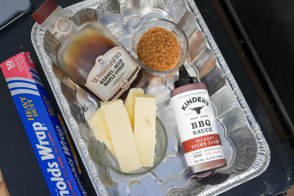 burnt bacon burnt end ingredients in a foil tray