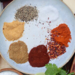 homemade fajita seasoning ingredients on a white plate