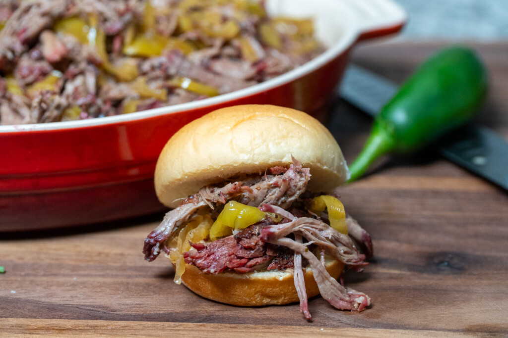a bread roll filled with mississippi pot roast