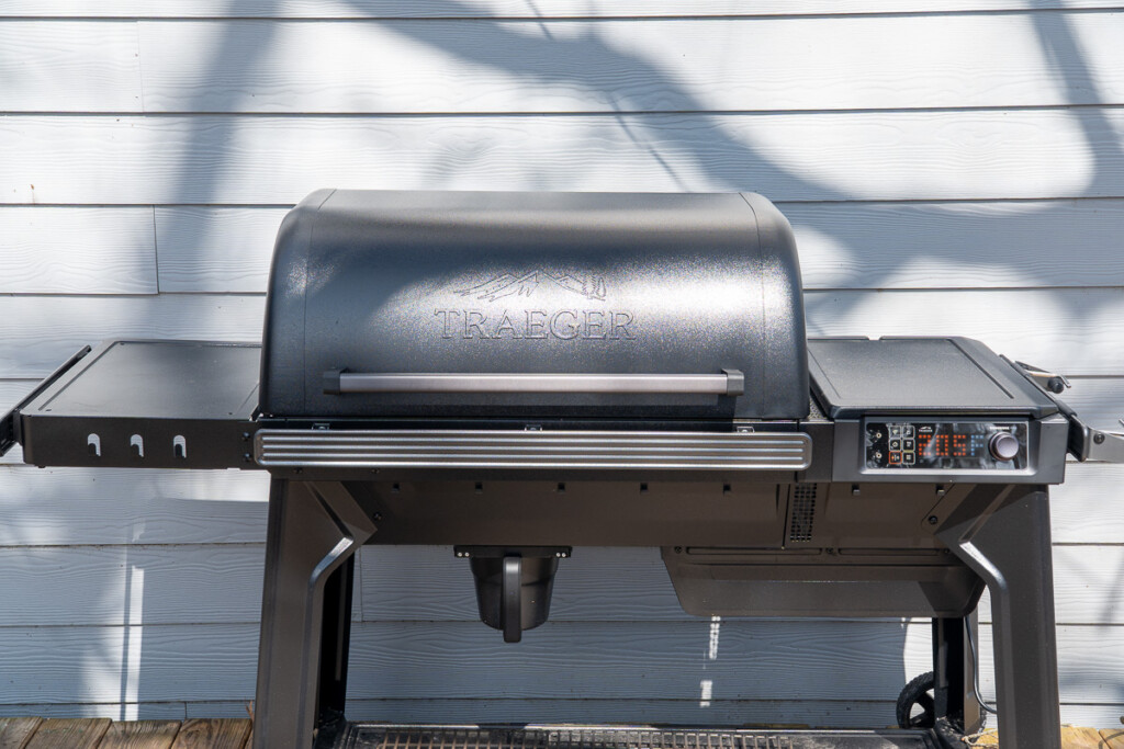 Front view of the Traeger Woodridge Pro grill with the lid closed and temperature controller active.
