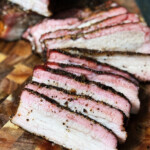 smoked pork belly on a wooden board