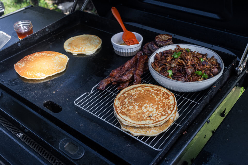 breakfast components laid out on the blackstone griddle