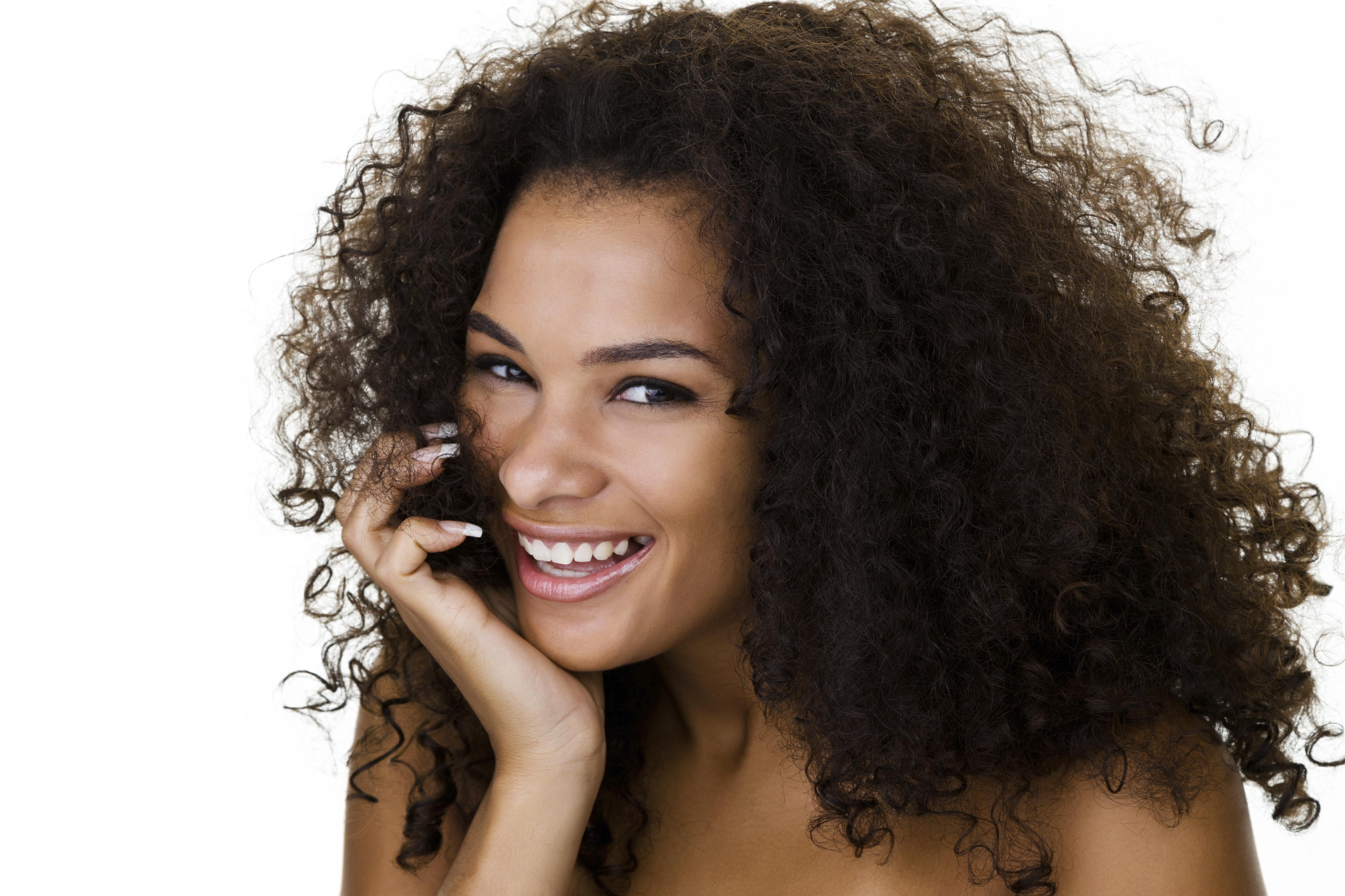 Mixed race woman laughing