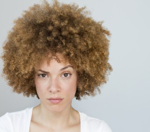 Black woman raising her eyebrow