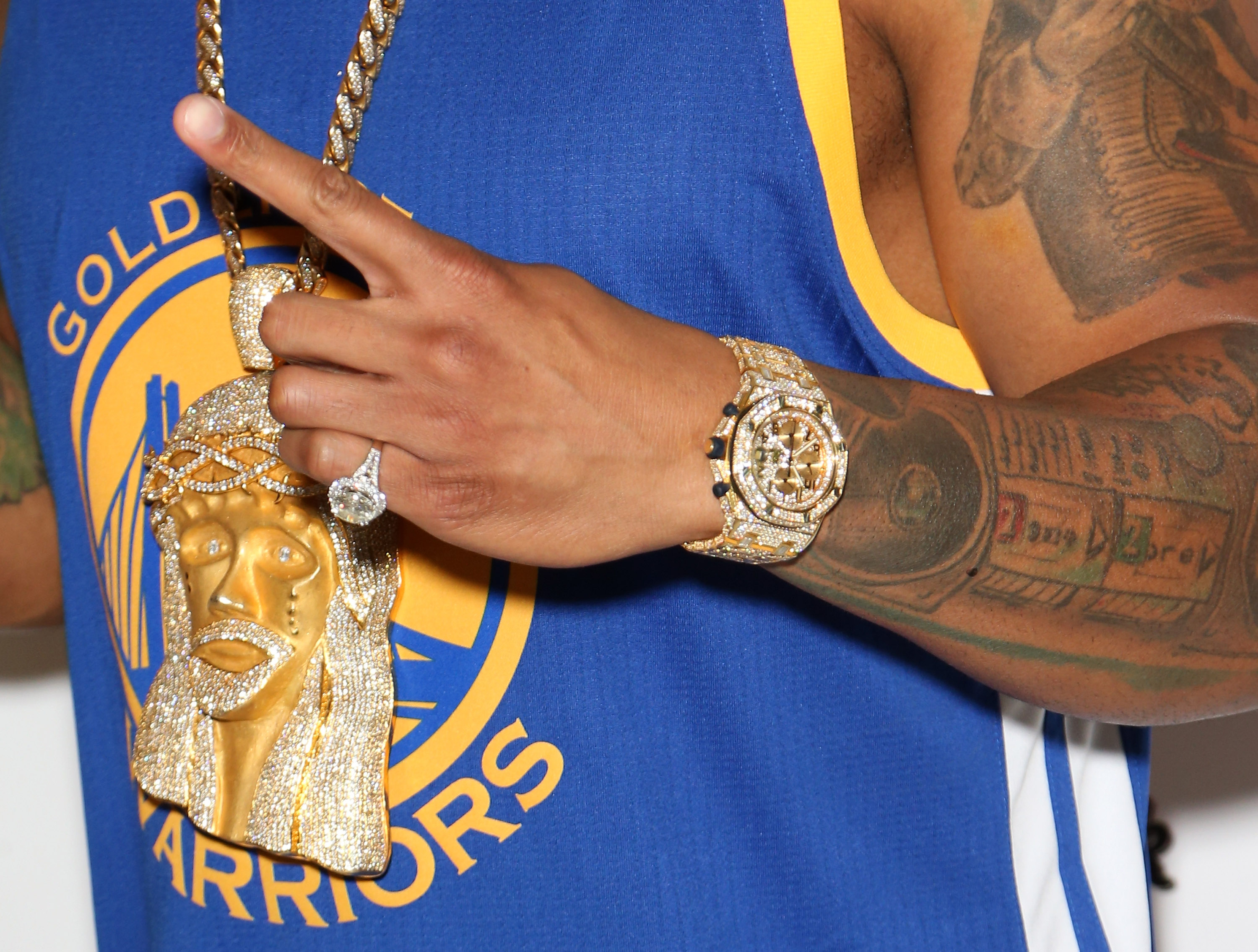 An uncle sporting a gold chain from Guyana
