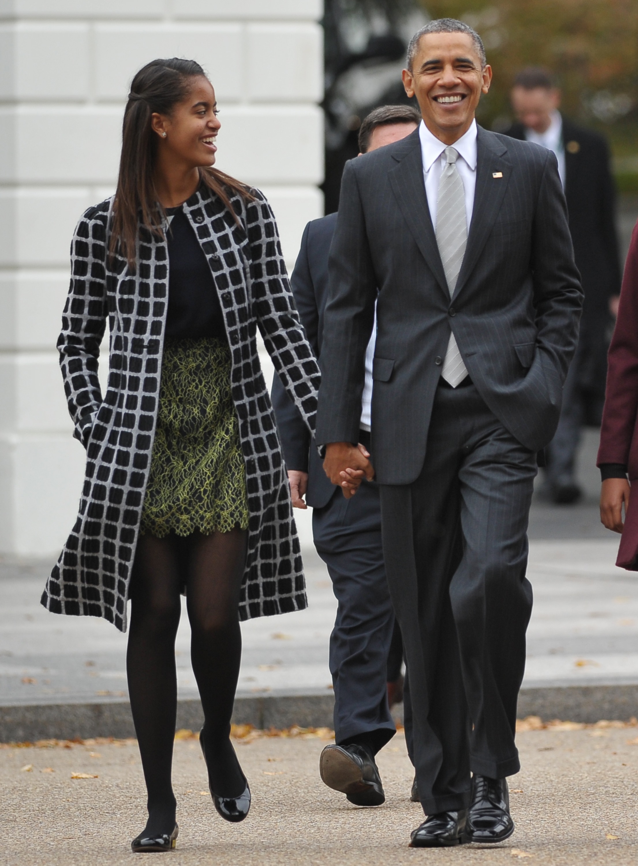 Malia Is Never Too Old To Hold Dad's Hand