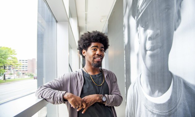 Devin Allen, amateur photographer whose photo of the Baltimore riots ended up on the cover of Time sets up a show at the Reginald Lewis Museum