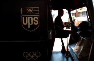 FI.UPS.silhouette.0801.AAGUnited Parcel Service deliveryman Ken Malek starts up his van to continu