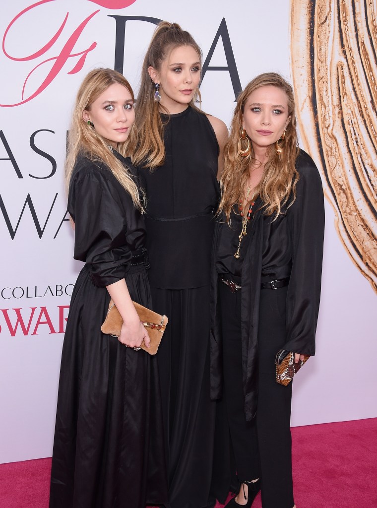 Elizabeth Olsen (center) and Mary-Kate and Ashley Olsen