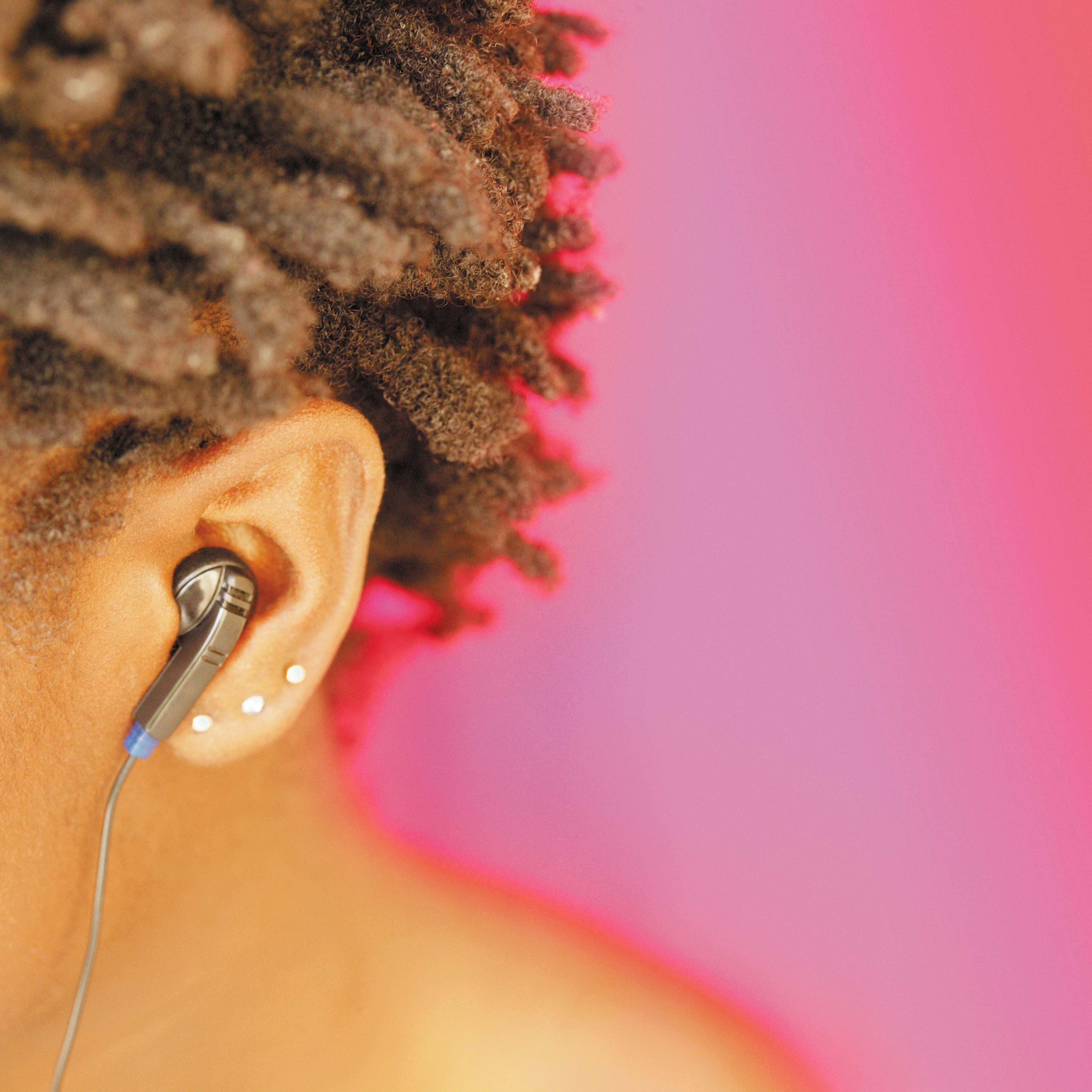 Earphone in Womans Ear