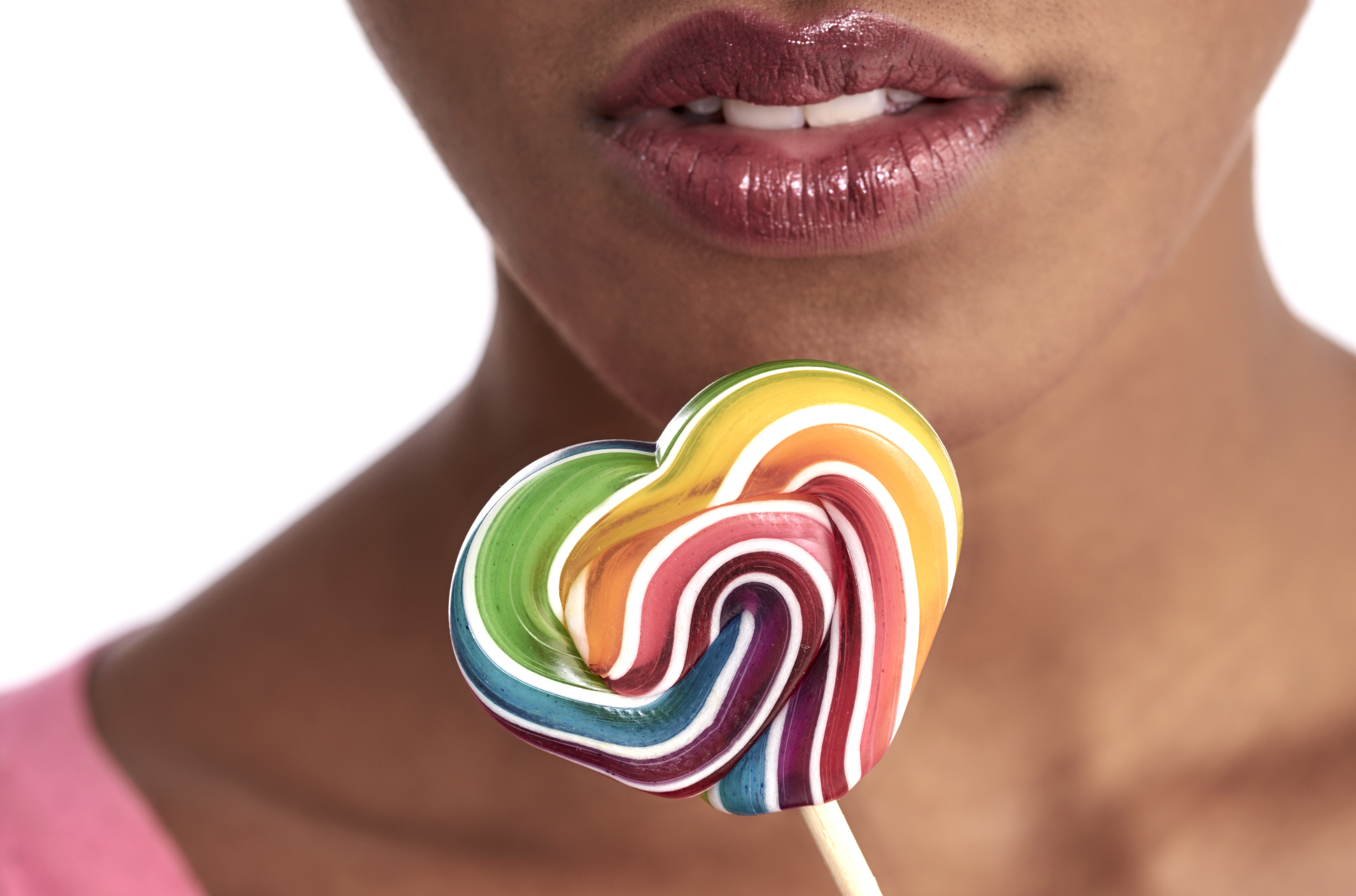 close up of a mouth and lollipop