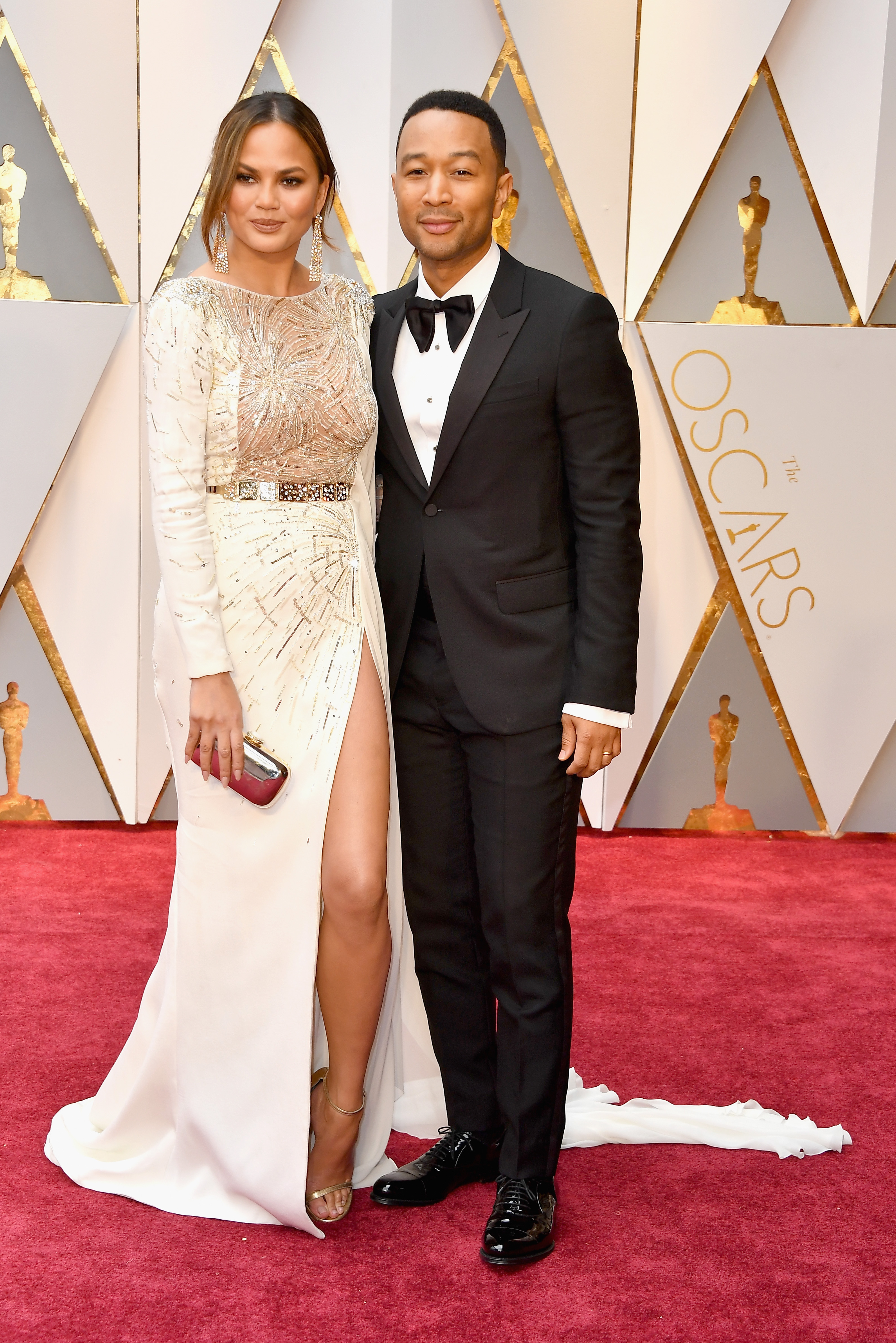 Chrissy Teigen In Zuhair Murad and John Legend in Gucci
