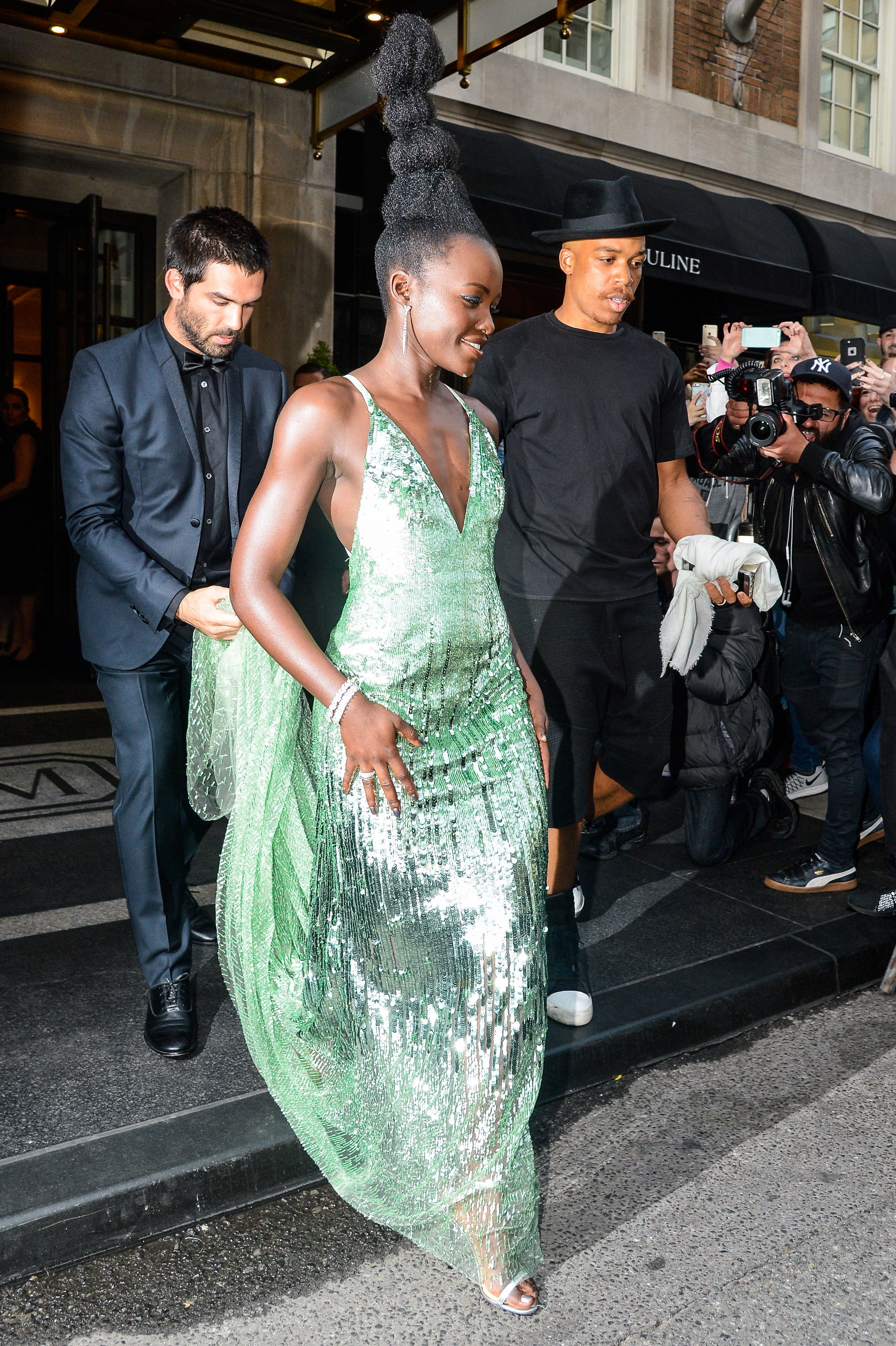 Lupita Nyong'o in a shimmery green dress