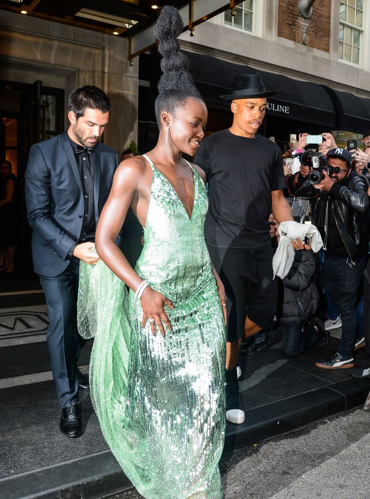 Lupita Nyong'o in a shimmery green dress
