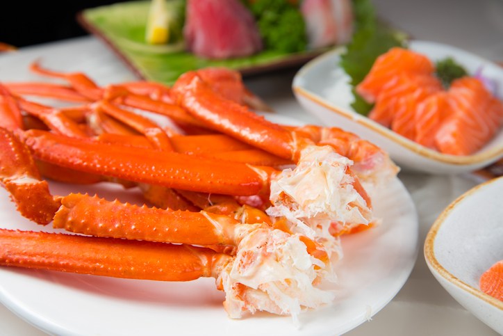 Meal of crab legs on plate