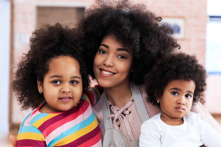 Portrait of a young mother with her daughters